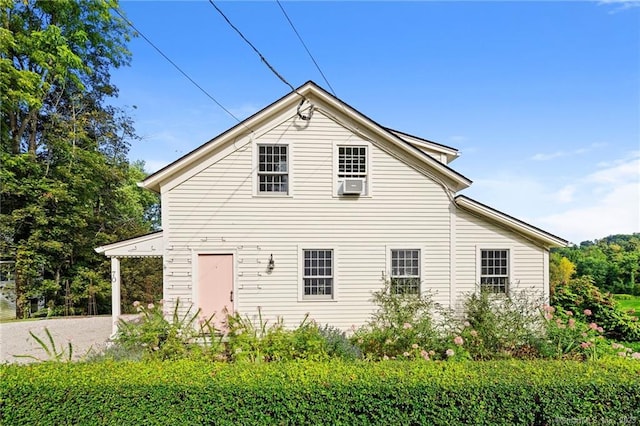 view of property exterior with cooling unit