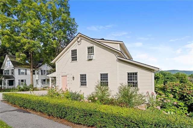 view of property exterior featuring cooling unit