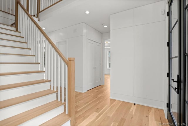 entrance foyer featuring light hardwood / wood-style flooring