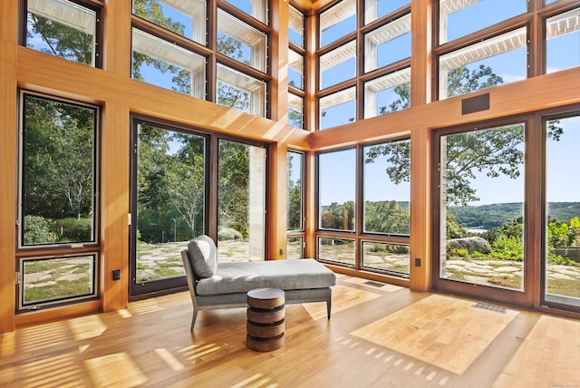 sunroom / solarium featuring a healthy amount of sunlight