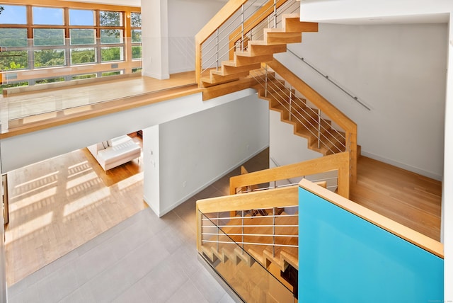 274 Joshuatown Rd, Lyme, CT 06371 - stairway with baseboards and tile patterned floors