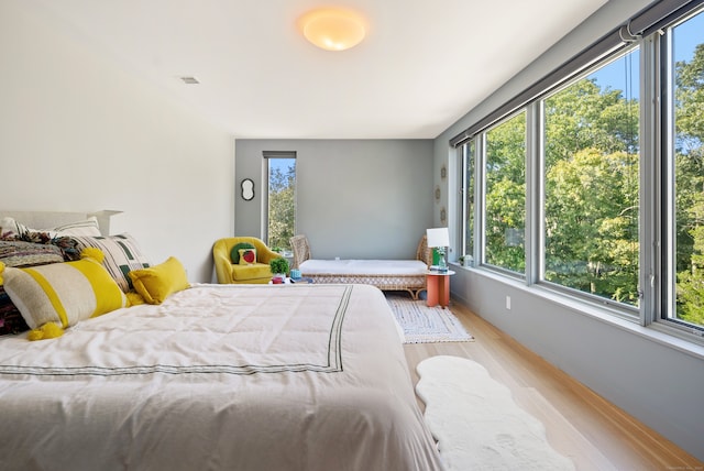 bedroom with light wood-type flooring