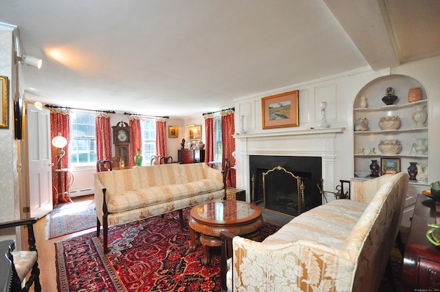 carpeted living room featuring a baseboard heating unit