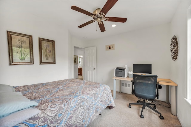 carpeted bedroom featuring radiator and ceiling fan