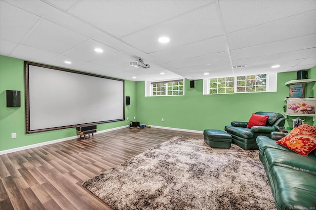 home theater room featuring hardwood / wood-style floors