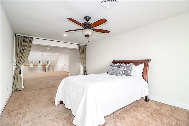 bedroom featuring ceiling fan and light colored carpet