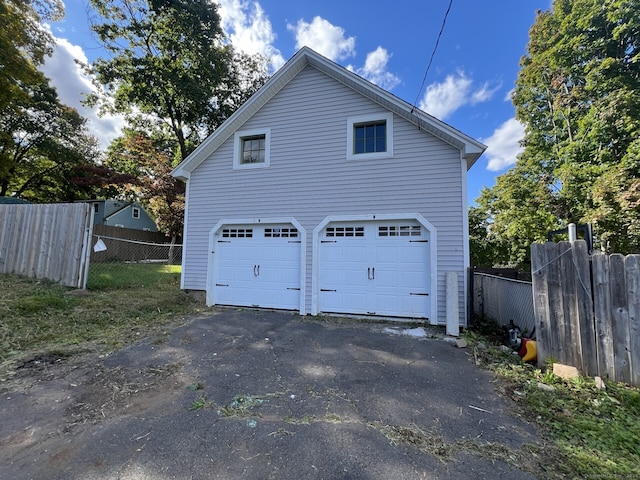 view of side of home with a garage