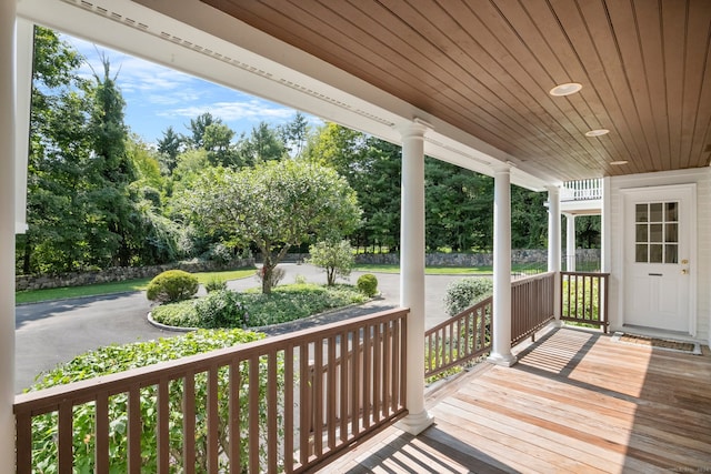 wooden terrace featuring a porch