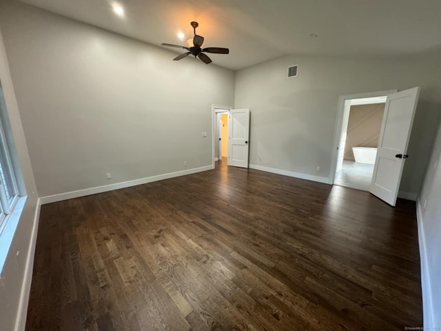 unfurnished bedroom with ceiling fan, dark hardwood / wood-style floors, and vaulted ceiling