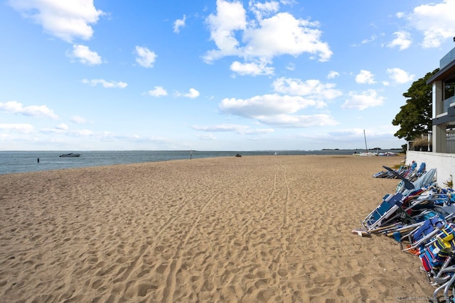 property view of water featuring a beach view