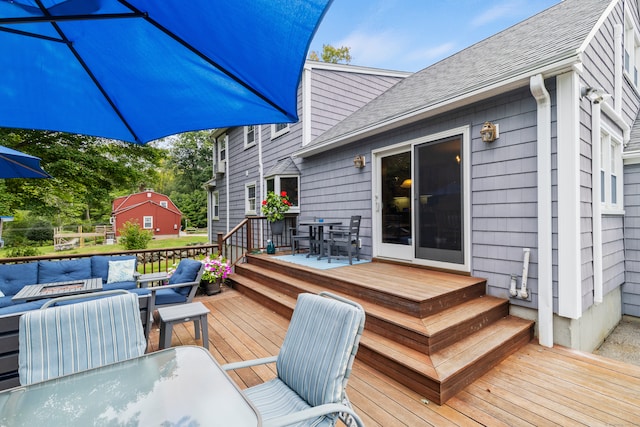 deck featuring outdoor lounge area