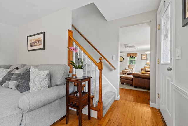 hall with hardwood / wood-style floors