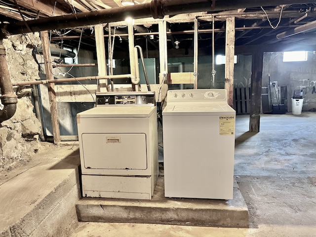 interior space with washer and clothes dryer