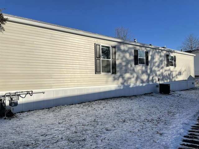 view of snow covered property