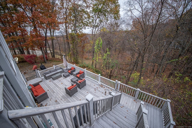 deck with an outdoor hangout area