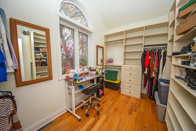 office with light wood-type flooring