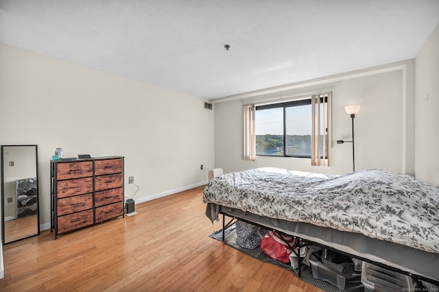 bedroom featuring light hardwood / wood-style flooring