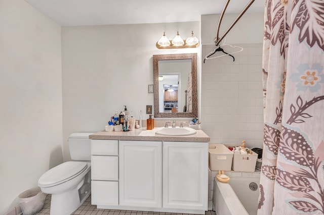 full bathroom featuring shower / tub combo, tile patterned flooring, vanity, and toilet