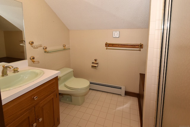 bathroom with tile patterned floors, vanity, a textured ceiling, a baseboard heating unit, and toilet