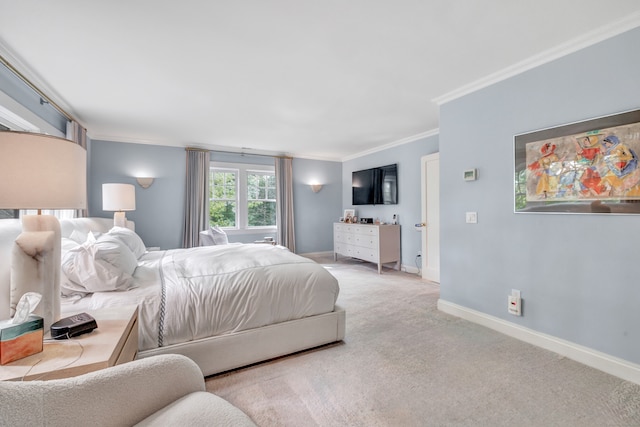 carpeted bedroom with ornamental molding