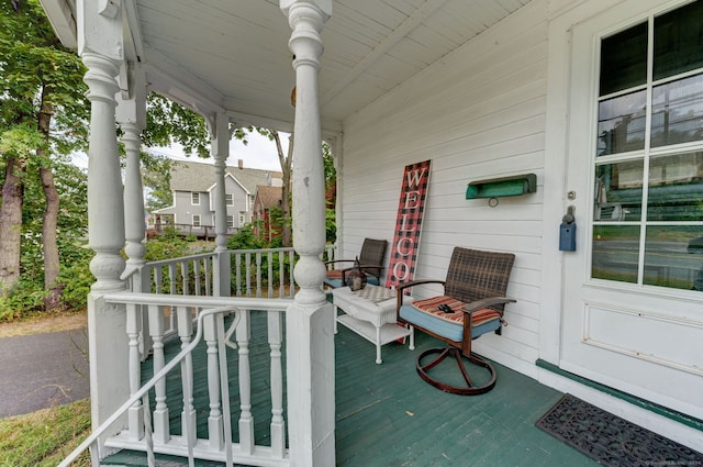 wooden terrace with covered porch