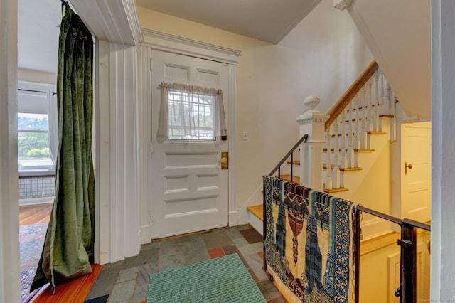 foyer entrance featuring hardwood / wood-style floors