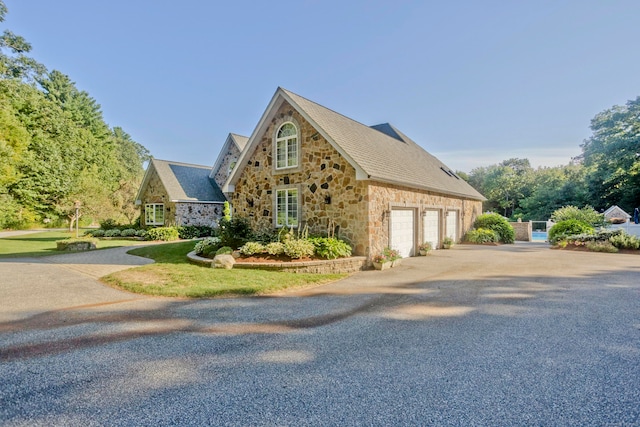 view of home's exterior with a garage