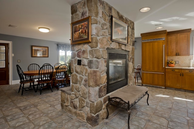 living room featuring a fireplace