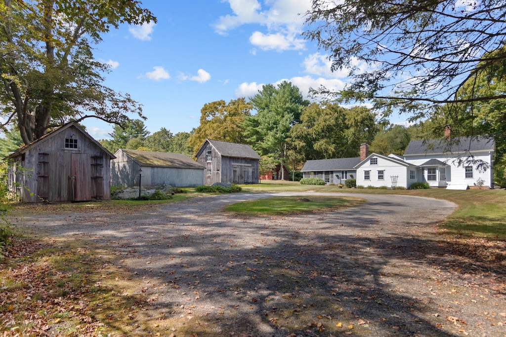 exterior space with a shed