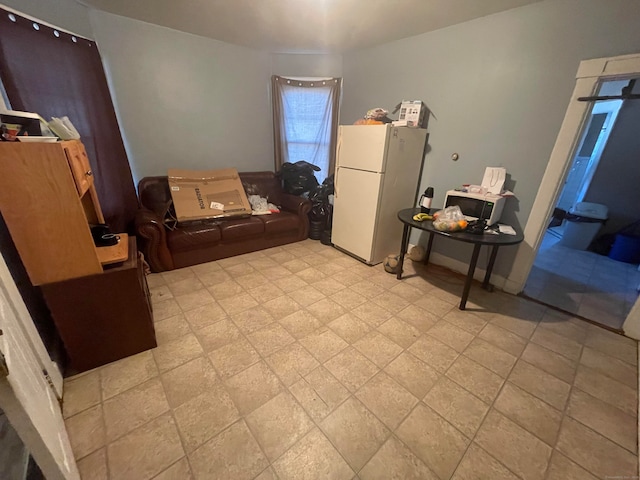 interior space featuring white fridge