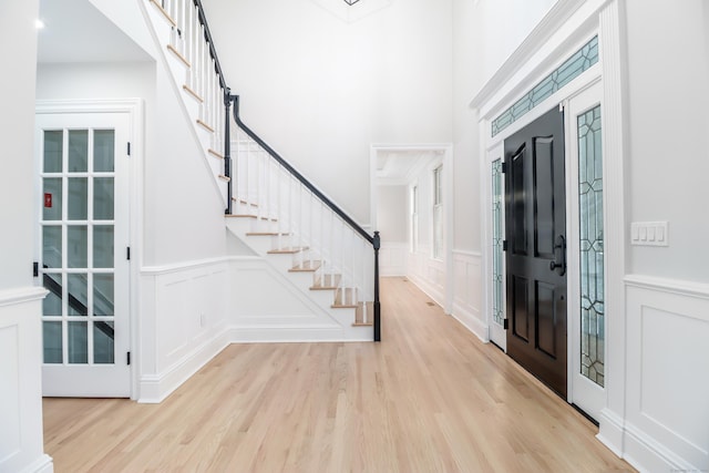 foyer with light hardwood / wood-style flooring