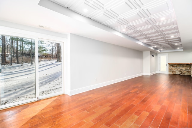 unfurnished living room with hardwood / wood-style floors