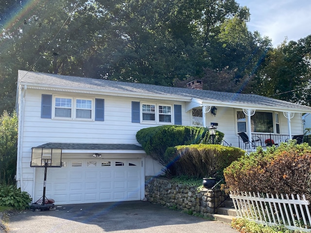 view of front of property featuring a garage