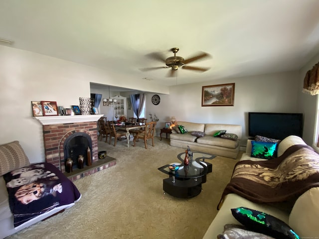 carpeted living room featuring ceiling fan and a fireplace