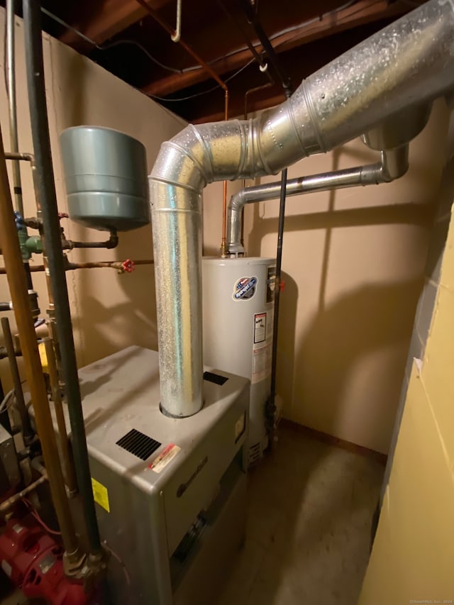 utility room featuring gas water heater