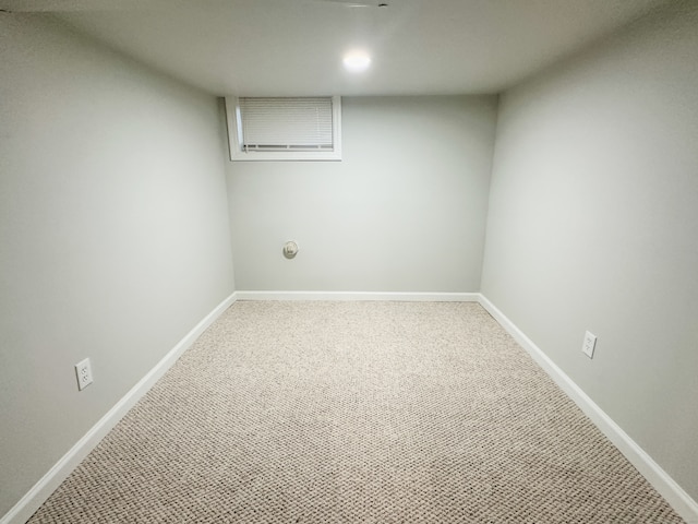 unfurnished room with carpet flooring