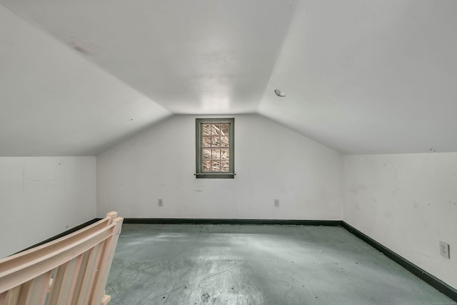 additional living space with lofted ceiling