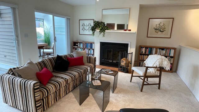 living room featuring light carpet