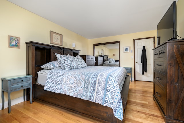 bedroom with light wood-type flooring