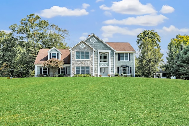 view of front of house featuring a front yard