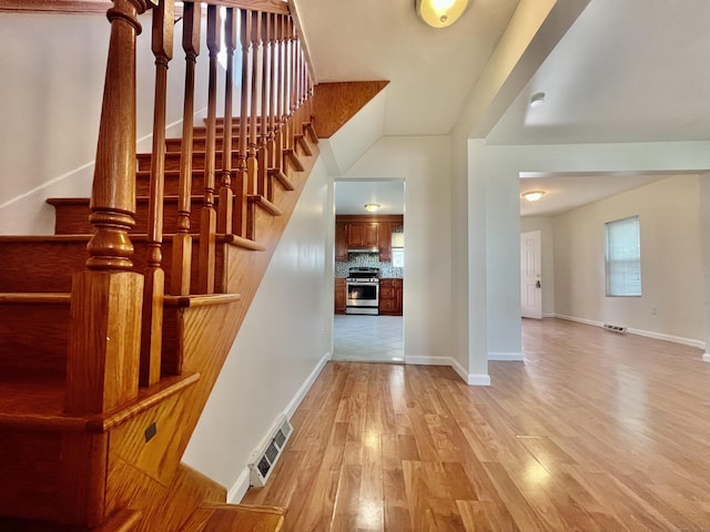 14 Bayview Pl, West Haven, CT 06516 - stairway with wood finished floors and baseboards