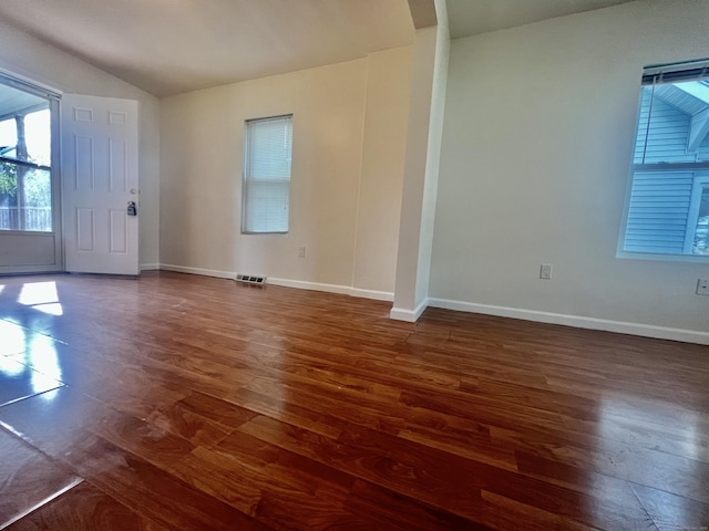 14 Bayview Pl, West Haven, CT 06516 - unfurnished room featuring dark wood-style floors, baseboards, and vaulted ceiling