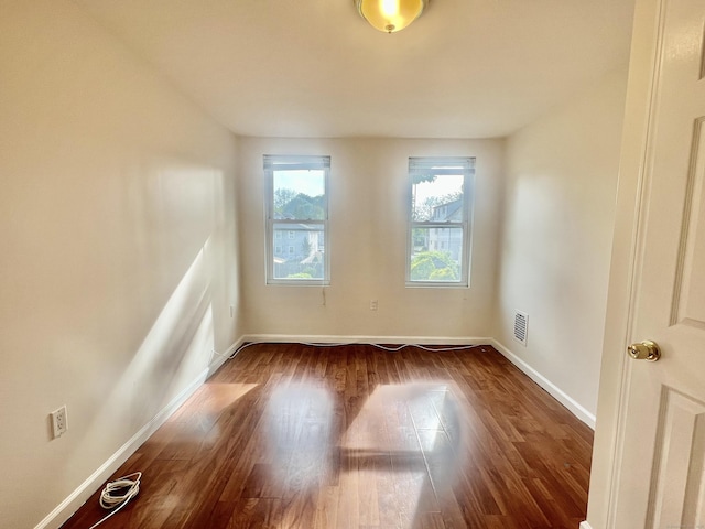 14 Bayview Pl, West Haven, CT 06516 - empty room featuring baseboards and dark wood finished floors