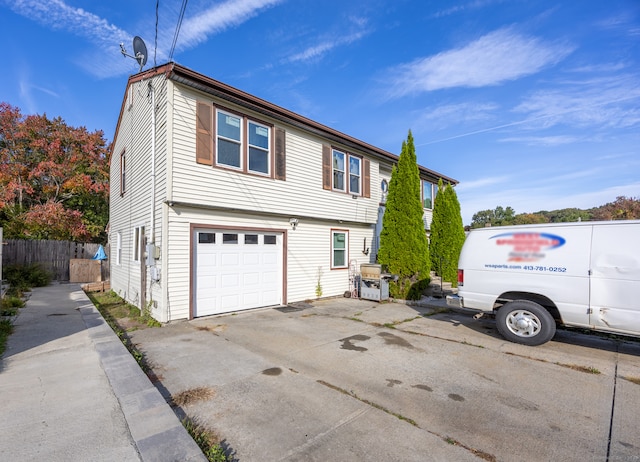 view of home's exterior featuring a garage