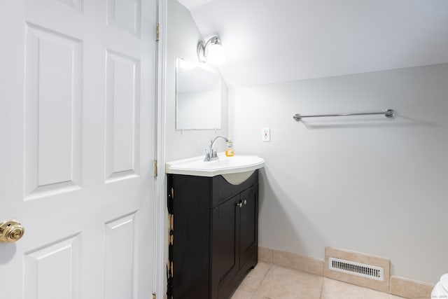 bathroom with vanity and tile patterned floors