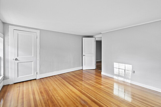 spare room featuring hardwood / wood-style floors