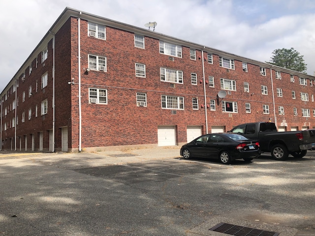 view of building exterior featuring a garage