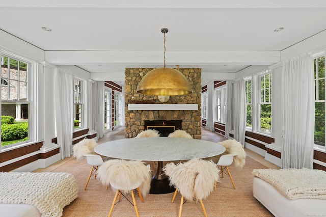 dining room featuring a fireplace