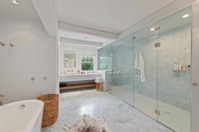 bathroom featuring crown molding, independent shower and bath, and vanity