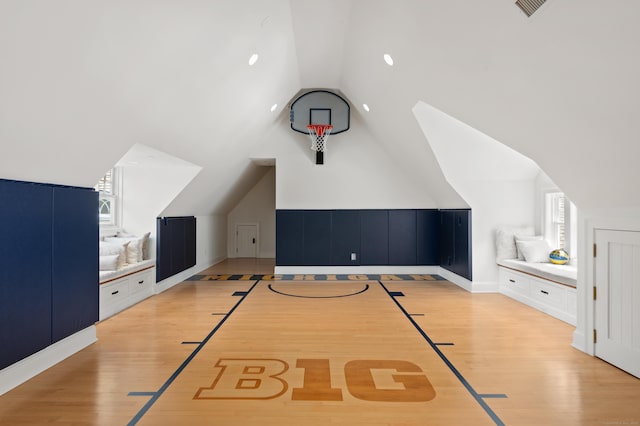9 Cowdray Park Dr, Greenwich, CT 06831 - additional living space featuring baseboards, basketball hoop, light wood-style floors, visible vents, and lofted ceiling